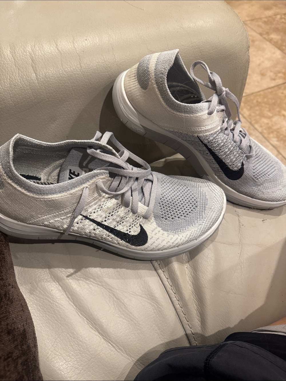 Nike Women's Flyknit Sneakers in Light Gray and Black